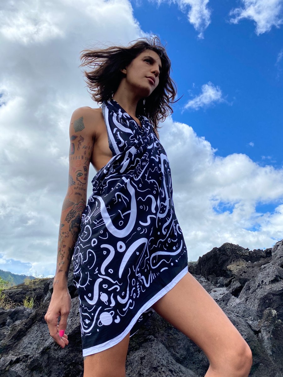 Black-and-white fabric against blue sky