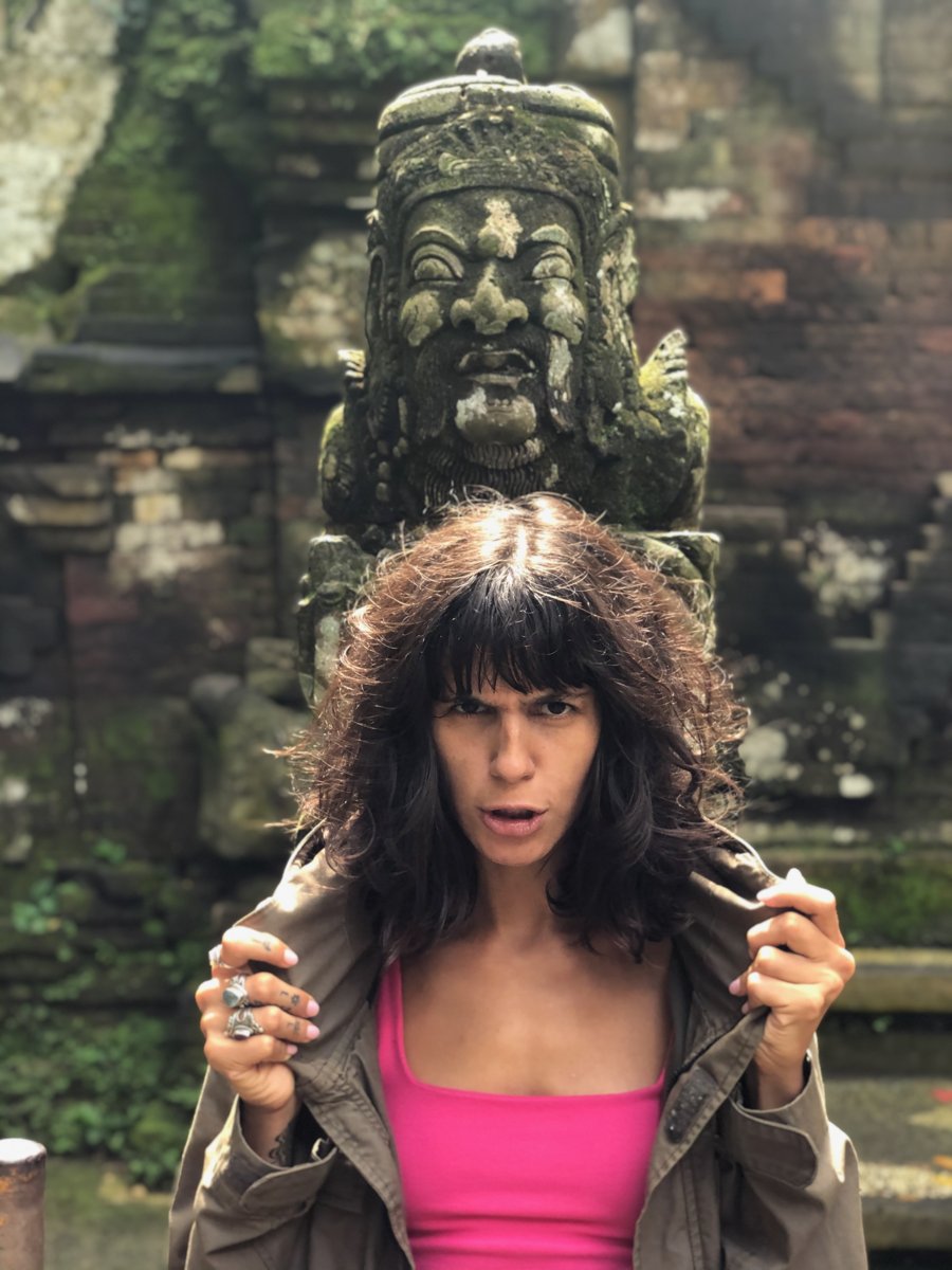 Pink top and carved stone